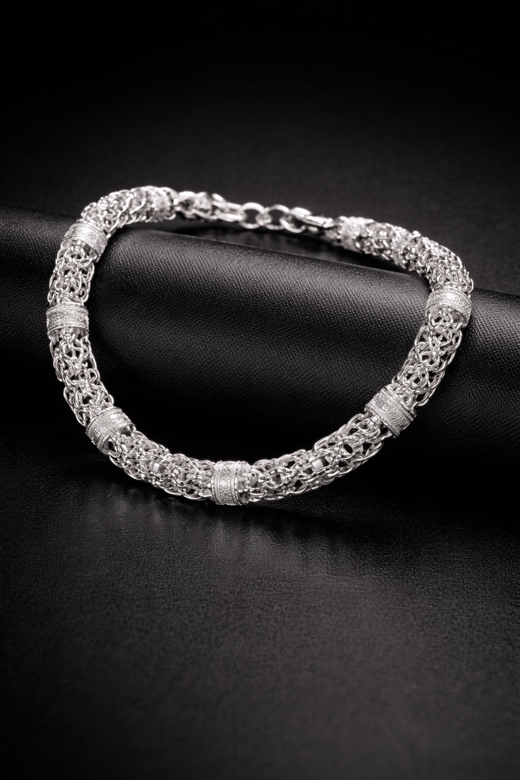 Intricate sterling silver necklace and bracelets